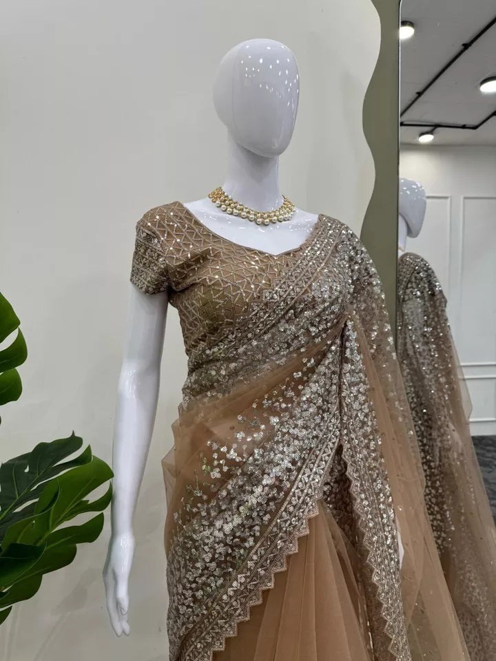 Classic Net Saree with Heavy Embroidery – Perfect for Celebrations Sari & Blouse