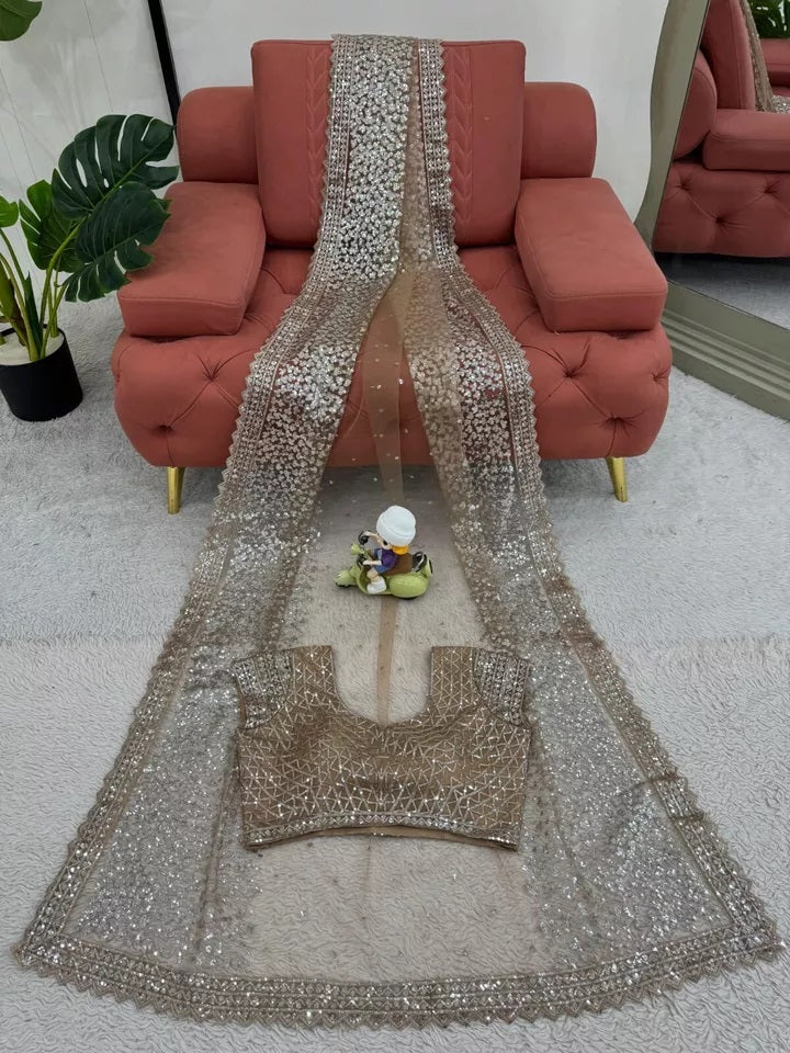 Classic Net Saree with Heavy Embroidery – Perfect for Celebrations Sari & Blouse